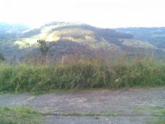 Located on a mountain top with a great view all around. Water and electricity to the land. Clear dee